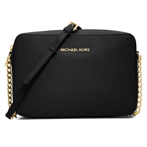 michael kors crossbody jet set bag|Michael Kors bag with airplanes.